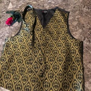 Boy’s medium black and gold vest and tie set.
